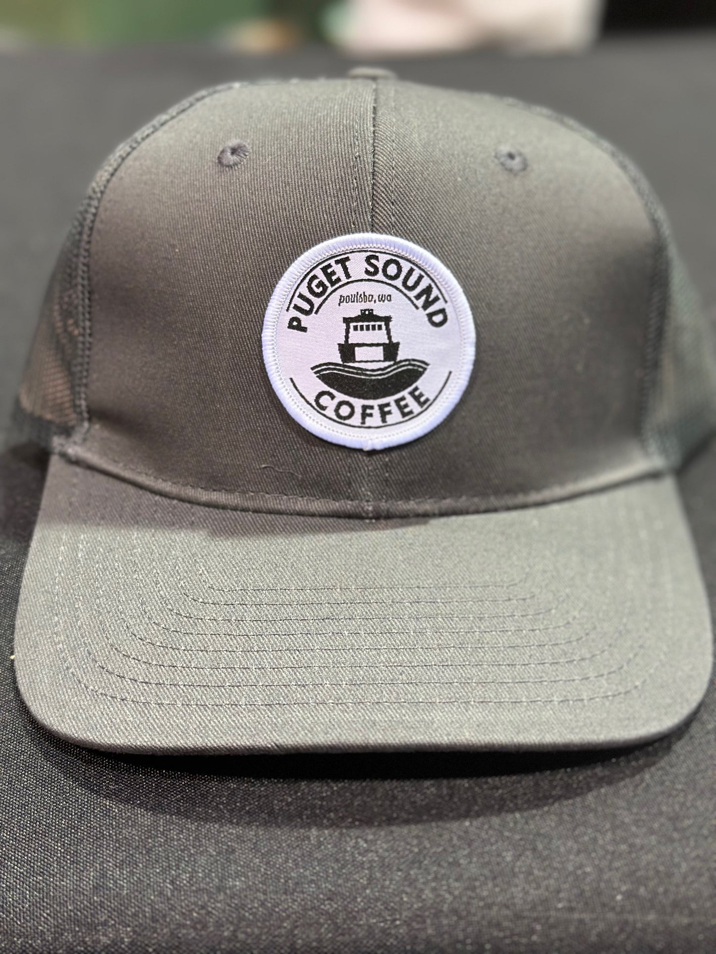 Puget Sound Coffee Patch on a Trucker Hat