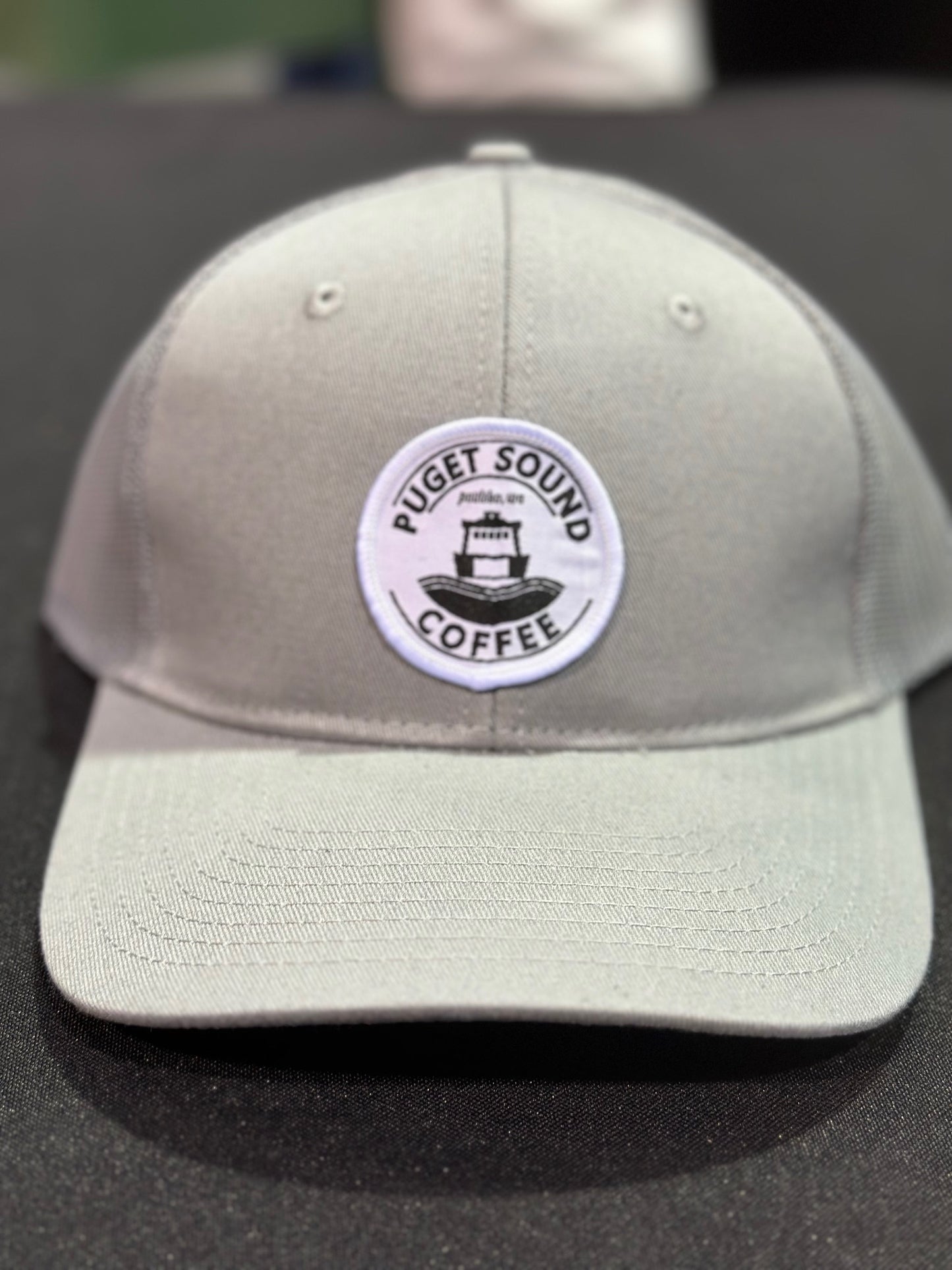 Puget Sound Coffee Patch on a Trucker Hat