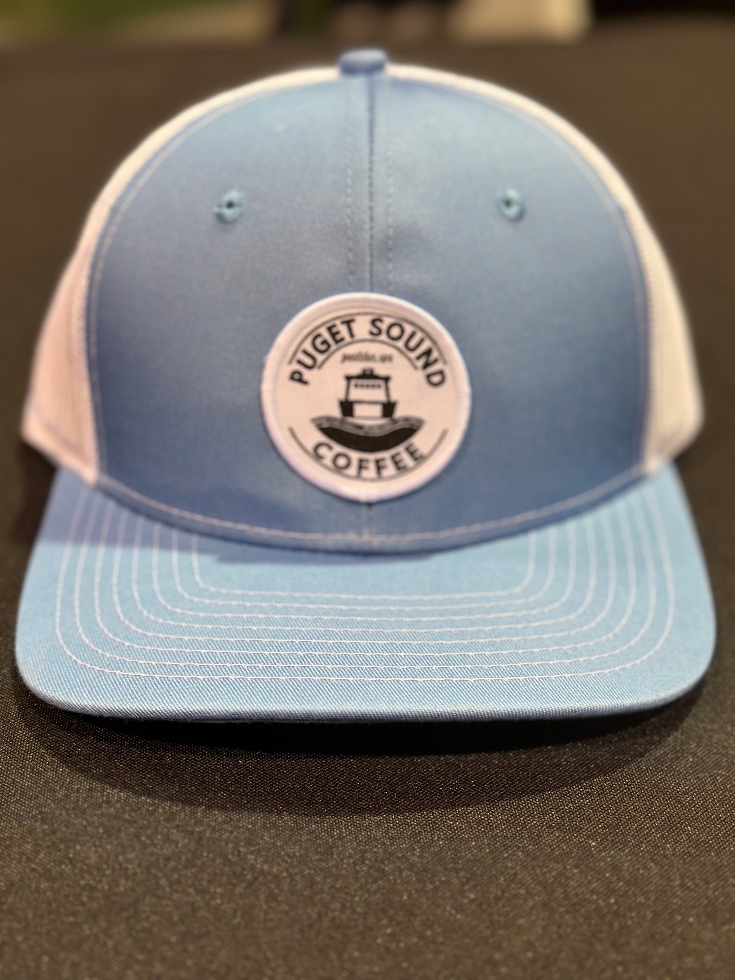 Puget Sound Coffee Patch on a Trucker Hat
