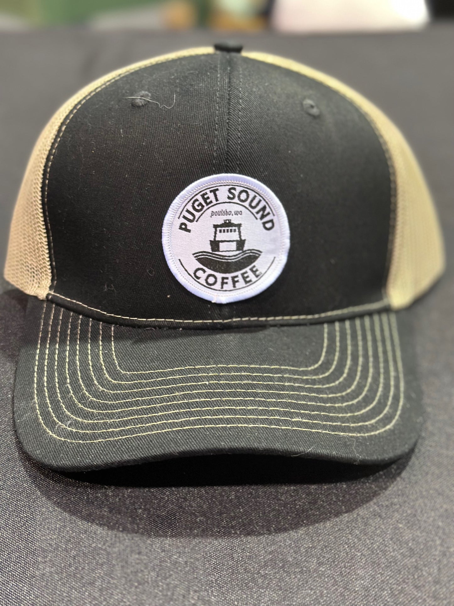 Puget Sound Coffee Patch on a Trucker Hat